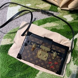 Louis Vuitton Monogram Petite Malle.